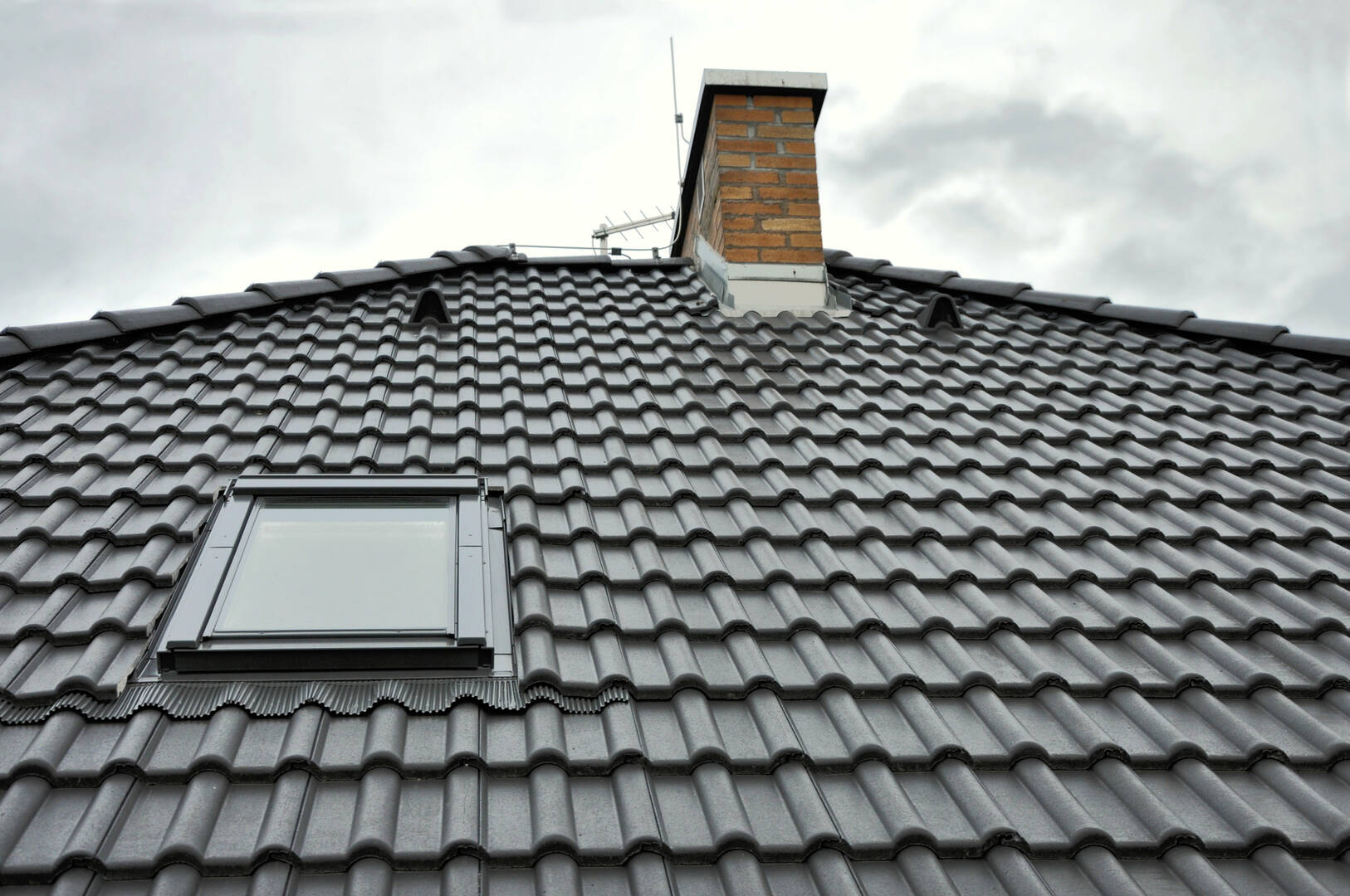 Patrick Kelly Roofing & Siding logo